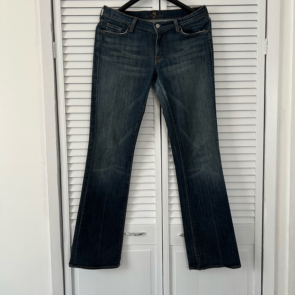 7 For All Mankind Deep Indigo Blue Boot Cut Jeans with Fading and Stretch Fabric